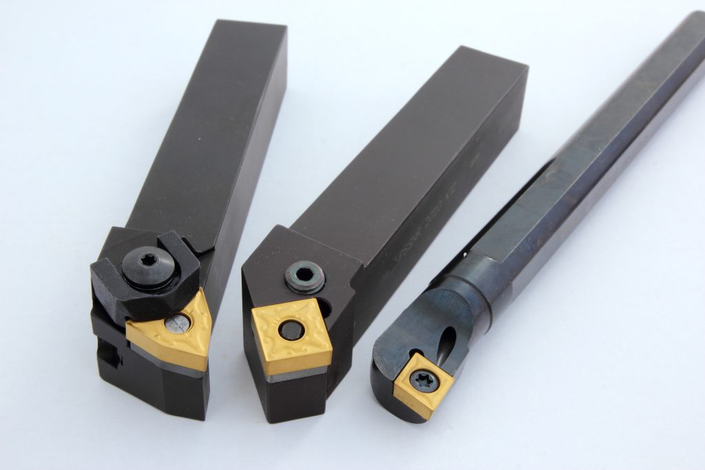 Coated carbide cutting tools for lathe use.